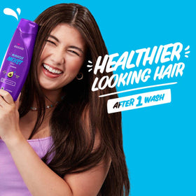Aussie Miracle Moist Shampoo 12.1 Fl Oz with lathered hair