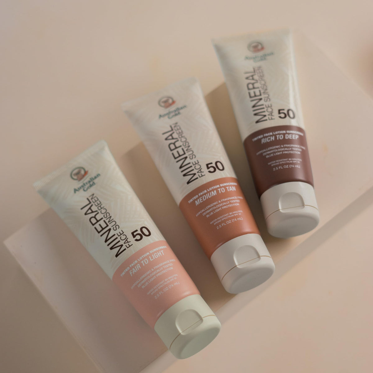 Australian Gold SPF 50 Tinted Mineral Face Sunscreen Rich-Deep with makeup products