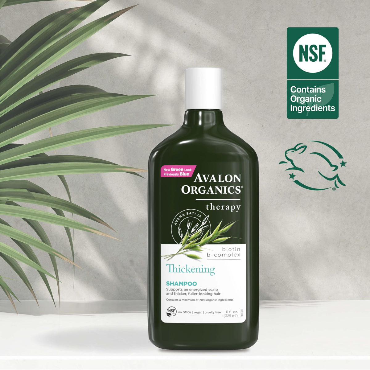 Avalon Organics shampoo bottle on a bathroom shelf
