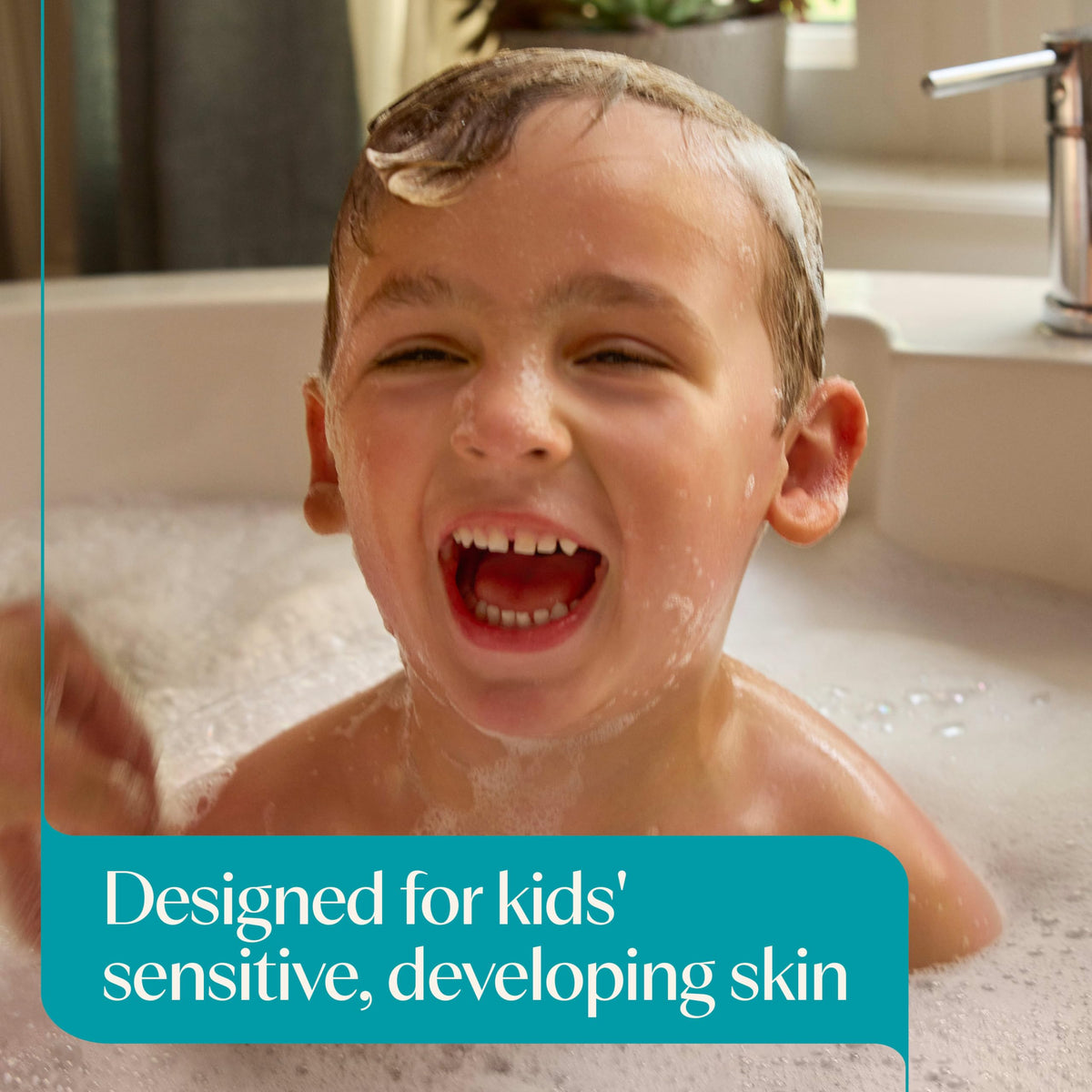 Aveeno Baby Kids Face & Body Wash in bathroom setting