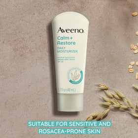 Aveeno Calm + Restore Daily Moisturizer Mineral Sunscreen application on skin