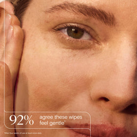 Aveeno Calm + Restore Unscented Makeup Remover Wipes opened with a wipe visible