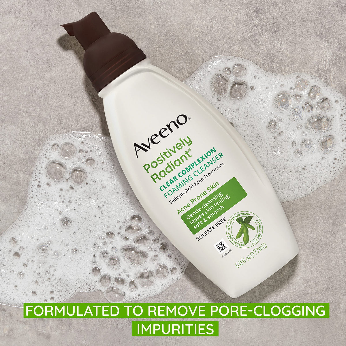 Aveeno Clear Complexion Foaming Cleanser in a bathroom setting