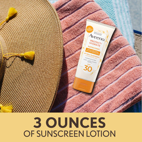 Aveeno Protect + Hydrate SPF 30 Sunscreen Lotion on a beach
