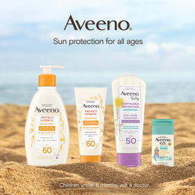 Aveeno Protect + Hydrate Sunscreen Lotion with beach accessories