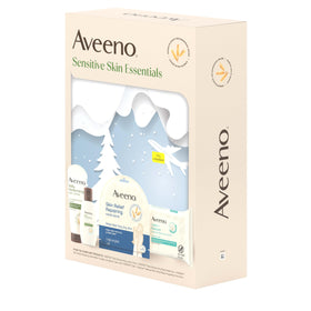 Aveeno Sensitive Skin Essentials Gift Set arranged on a bathroom counter