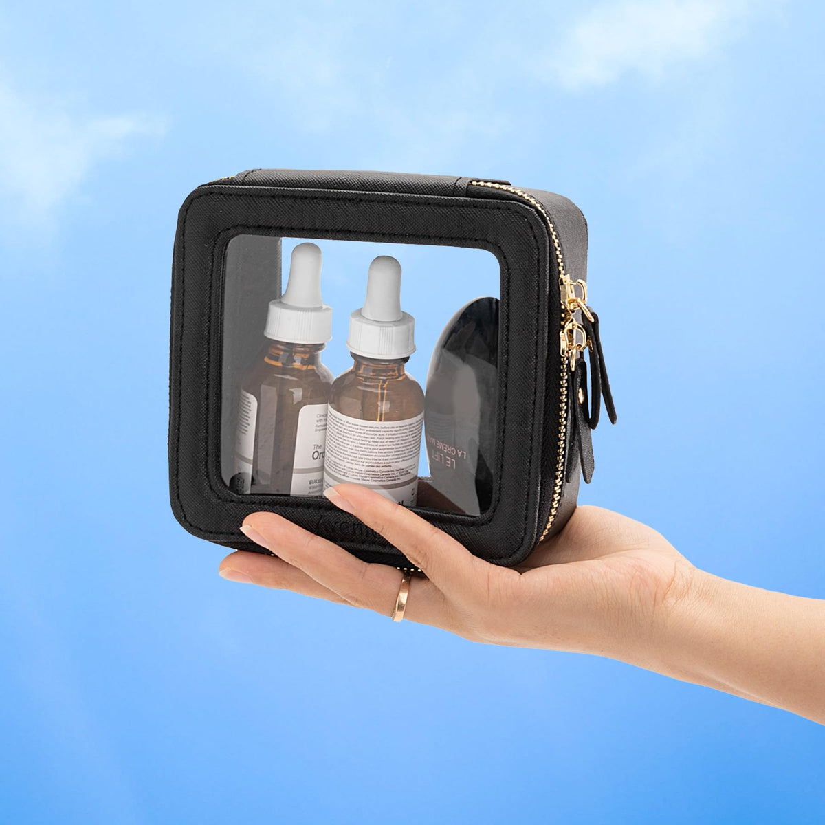 Aveniee Clear Makeup Bag on a bathroom counter