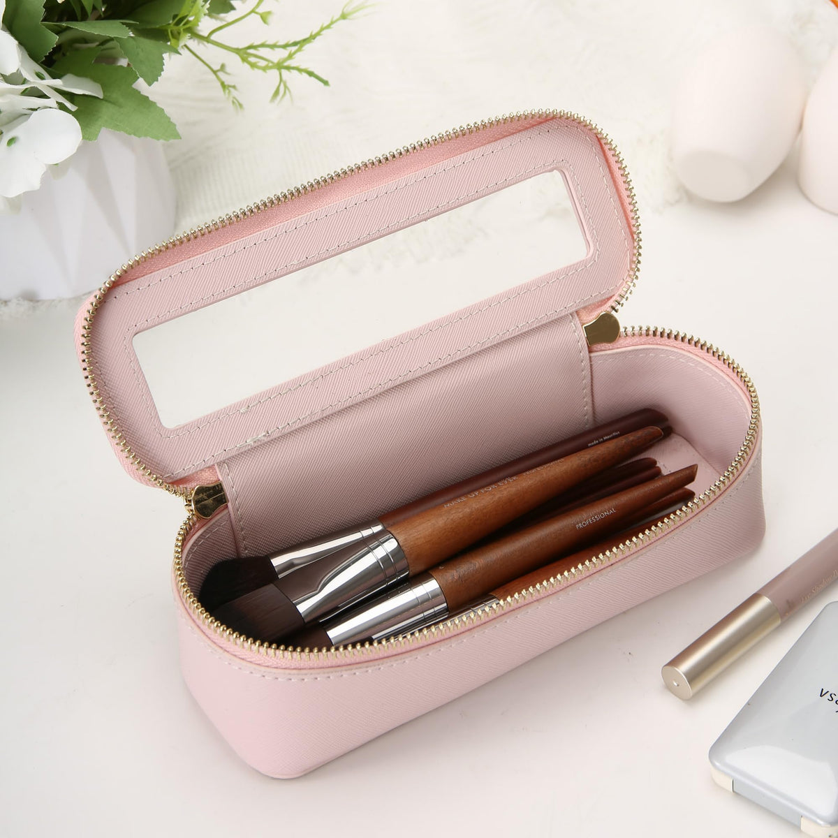 Aveniee Clear Makeup Brush Bag in a travel setting