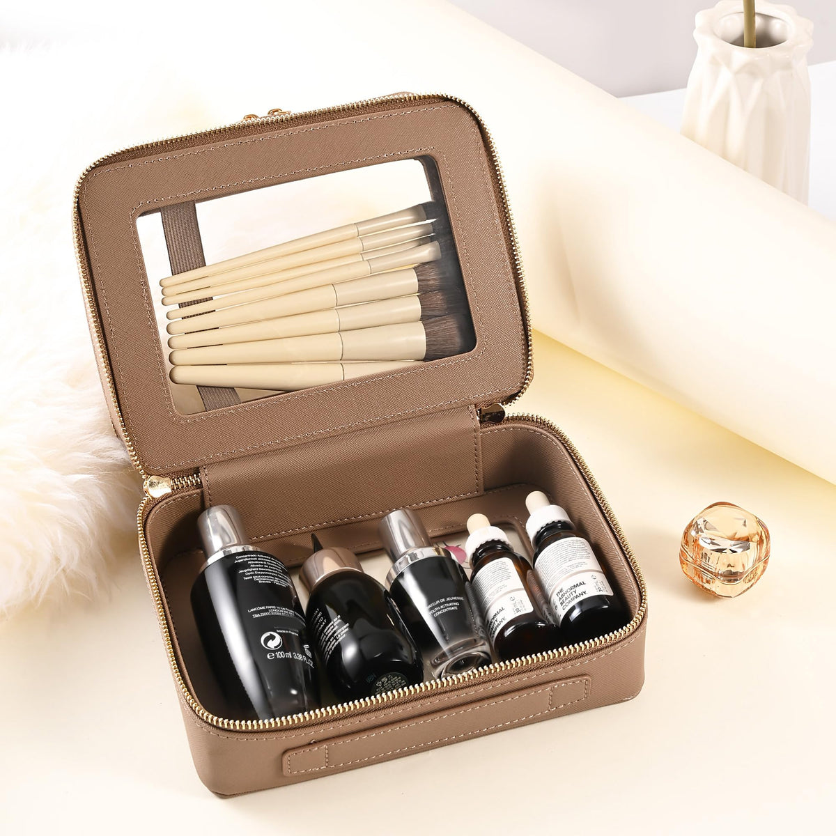 Aveniee Large Clear Makeup Bag open displaying cosmetics