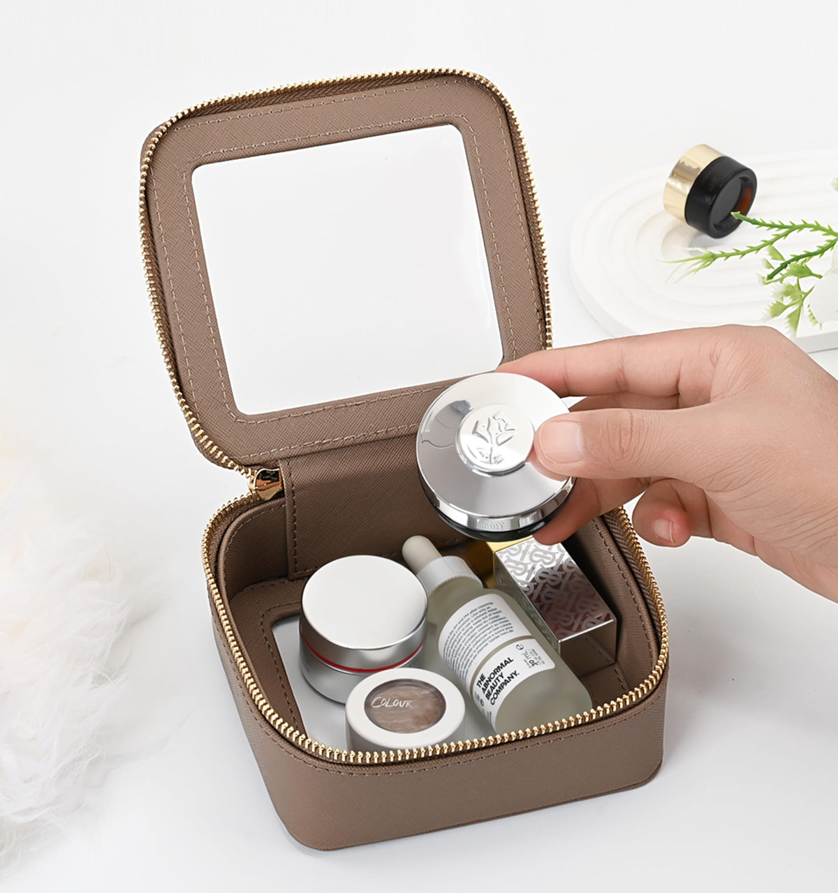 Aveniee Mini Clear Makeup Bag taupe in lifestyle setting