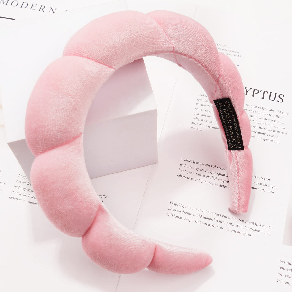 Ayesha Fluffy Bubble Headband worn by a model during skincare routine