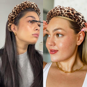 Ayesha Fluffy Spa Headband worn by a person applying makeup