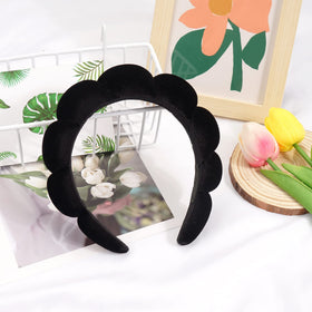 Ayesha Spa Headband worn by a model during skincare routine