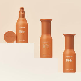 AYUNCHE Enrich Bonding Hair Oil bottle with background