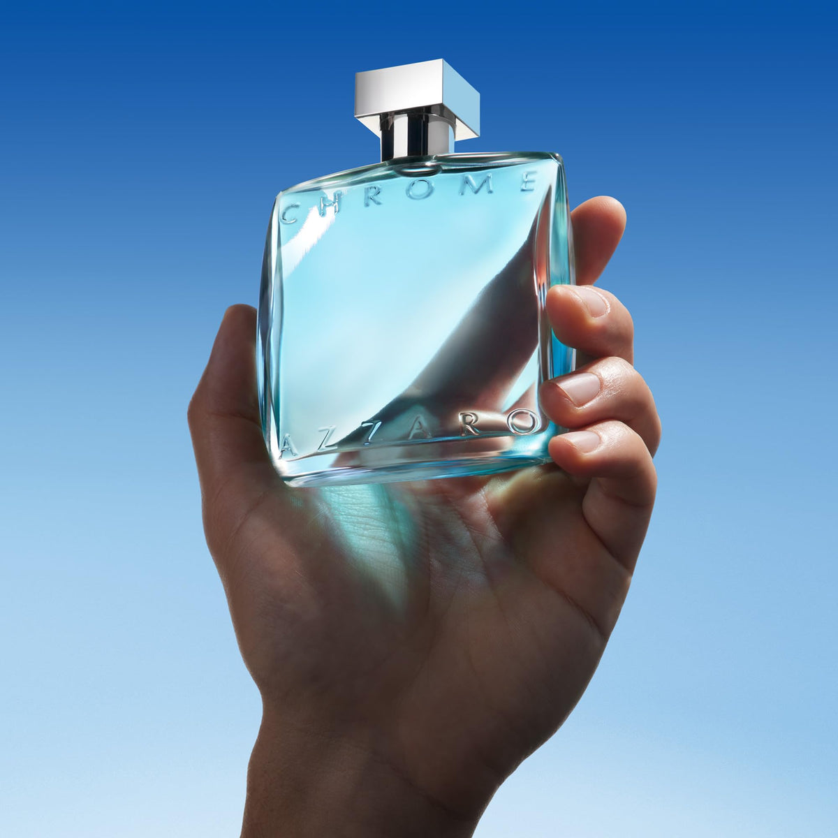 Azzaro Chrome bottle with citrus fruits