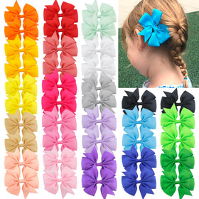 Babymatch Pinwheel Hair Bow with alligator clip close-up