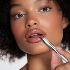 BAISEN DIARY Honey Lipstick Tinted Lip Balm in black shade on a white background