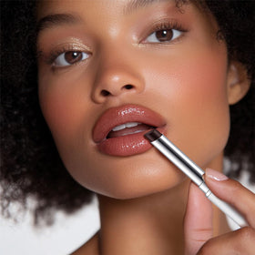 BAISEN DIARY Honey Lipstick Tinted Lip Balm in nude shade on a white background