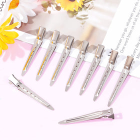 Bantoye Duck Bill Clips displayed on a styling station