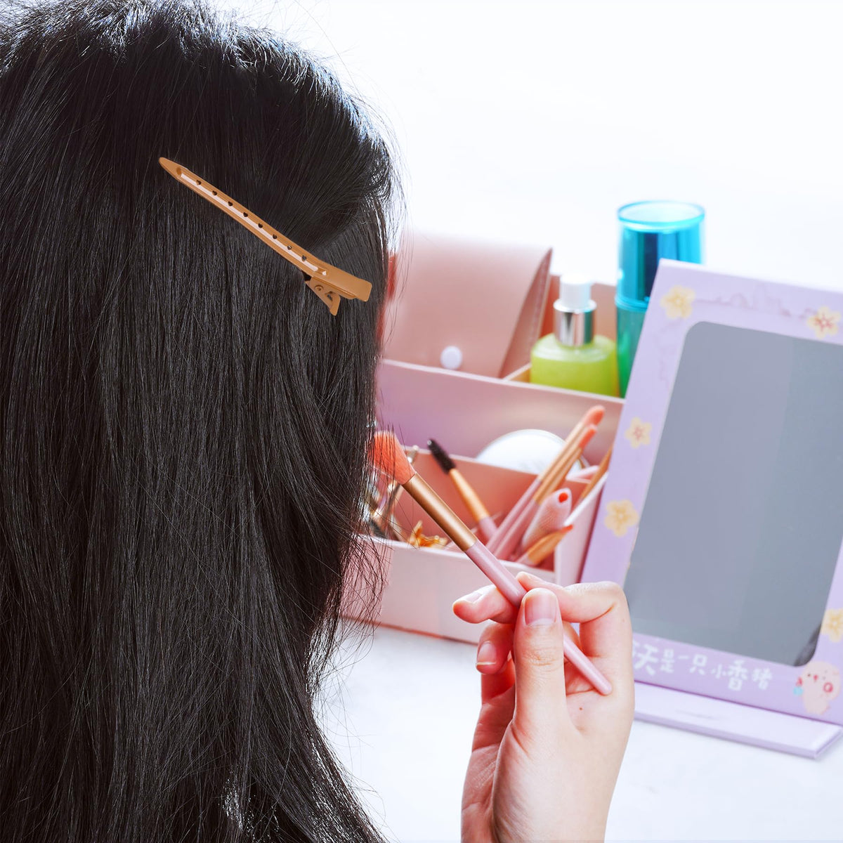 Bantoye Duck Bill Clips on a hair styling table