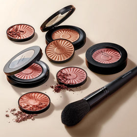 bareMinerals Gen Nude Blonzer Kiss Of Pink in use during makeup application