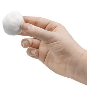 Basics Cotton Balls in a beauty setup with skincare products