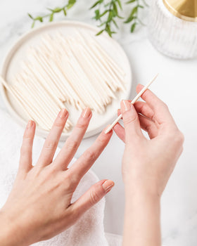 Basics Manicure Sticks displayed with nail care tools