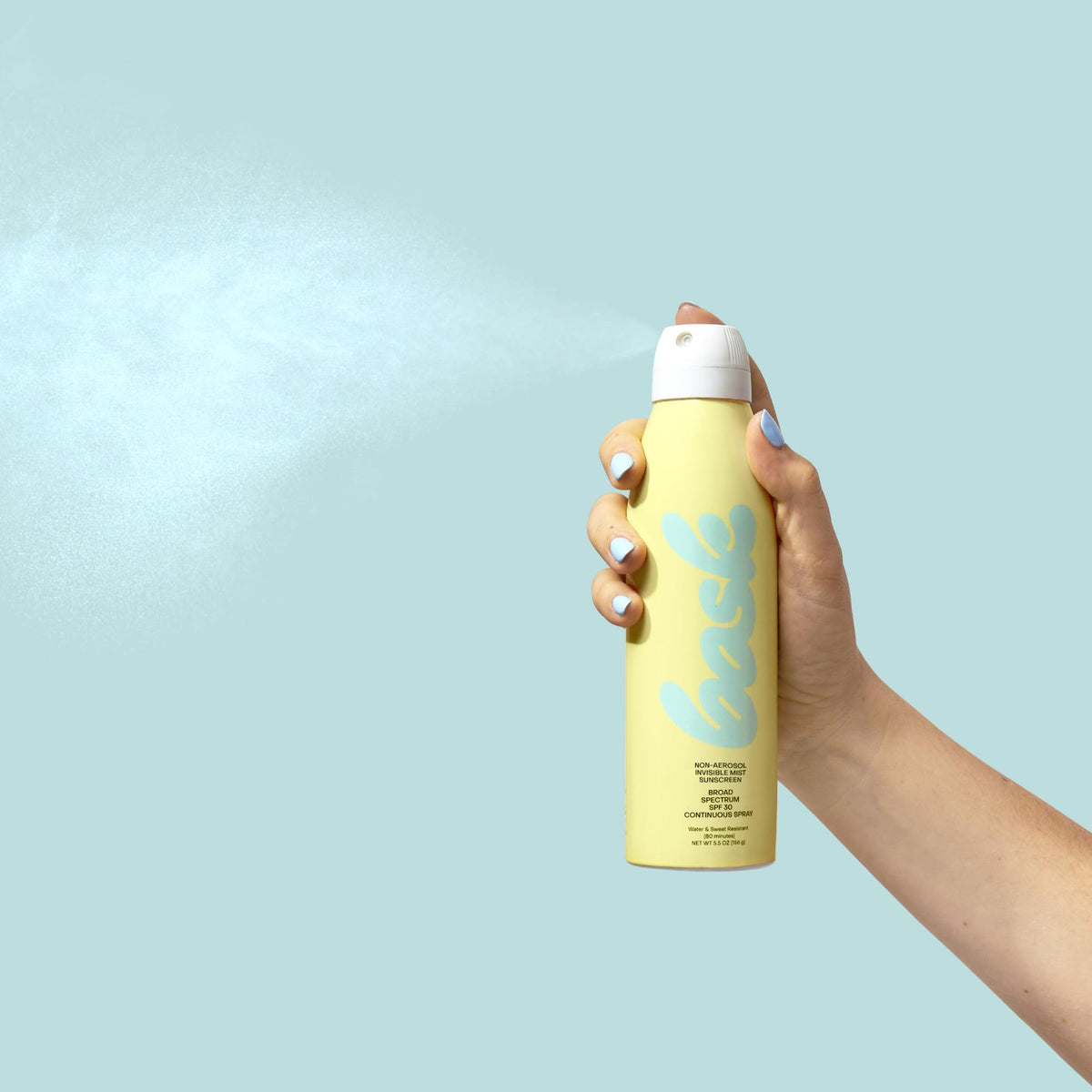 Bask SPF 30 Sunscreen Spray 5.5 oz application on skin