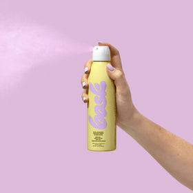 Bask SPF 50 Sunscreen Spray in use on skin