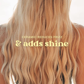 Beachwaver B1.25 Rotating Curling Iron Midnight Rose in use