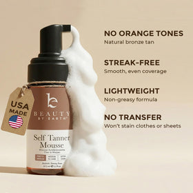 Beauty by Earth Self Tanner Mousse texture on hand