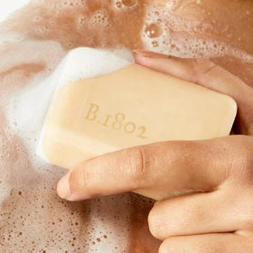 Beekman 1802 Goat Milk Soap Lilac Dream in a bathroom setting