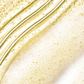 Beekman 1802 Micellar Milk Froth Face Wash side view showing texture