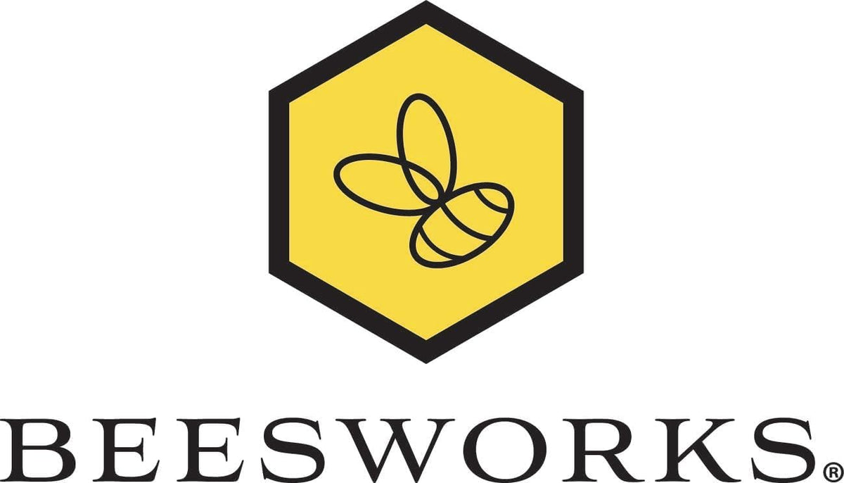 BEESWORKS Yellow Beeswax Pellets in a bowl