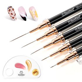 beetles Gel Polish Liner Brushes displayed on a table