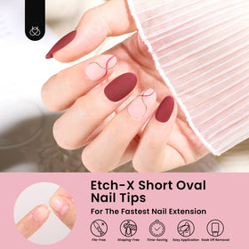 beetles Gel Polish Short Oval Nail Tips on a manicure table