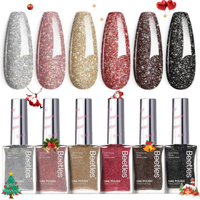 beetles nail polish in gold colour applied on nails