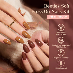 beetles Press On Nails Kit showing short almond nails in various styles
