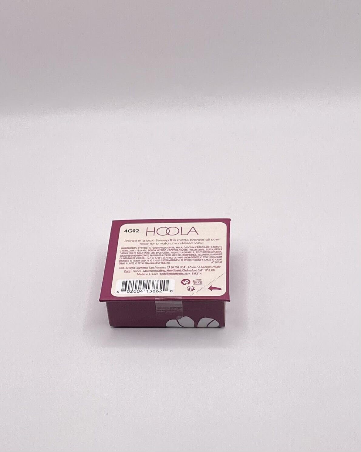 Benefit Hoola Matte Bronzer Mini on vanity with makeup