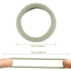 Bessrung hair ties displayed on a table with a soft texture