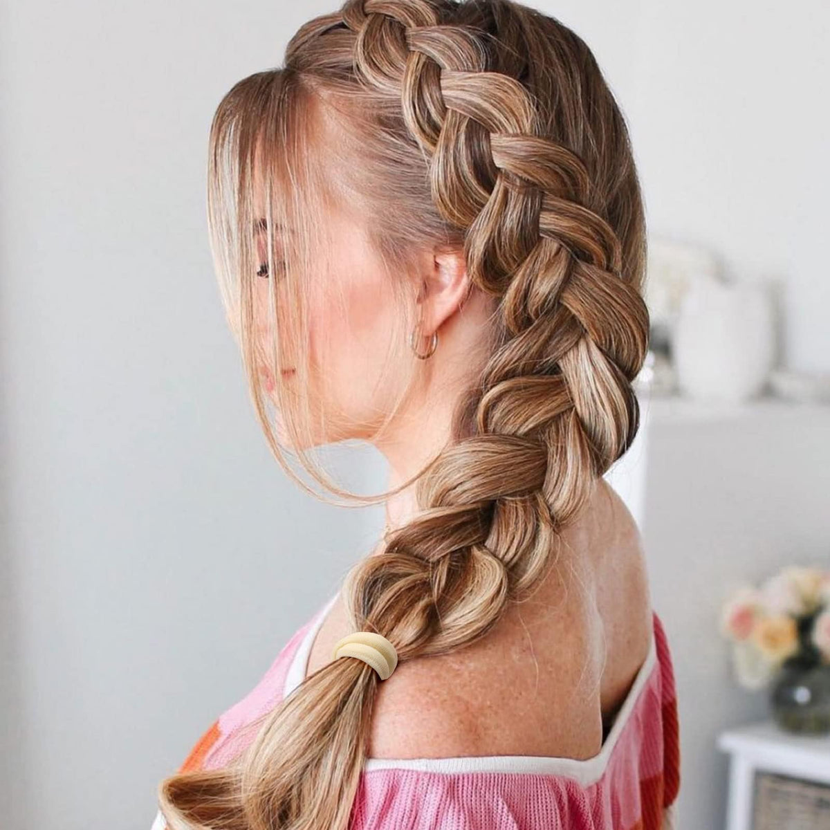 Bessrung hair ties in use on a ponytail hairstyle