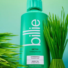 Billie Detox Body Wash 18 Fl Oz in a bathroom setting with plants