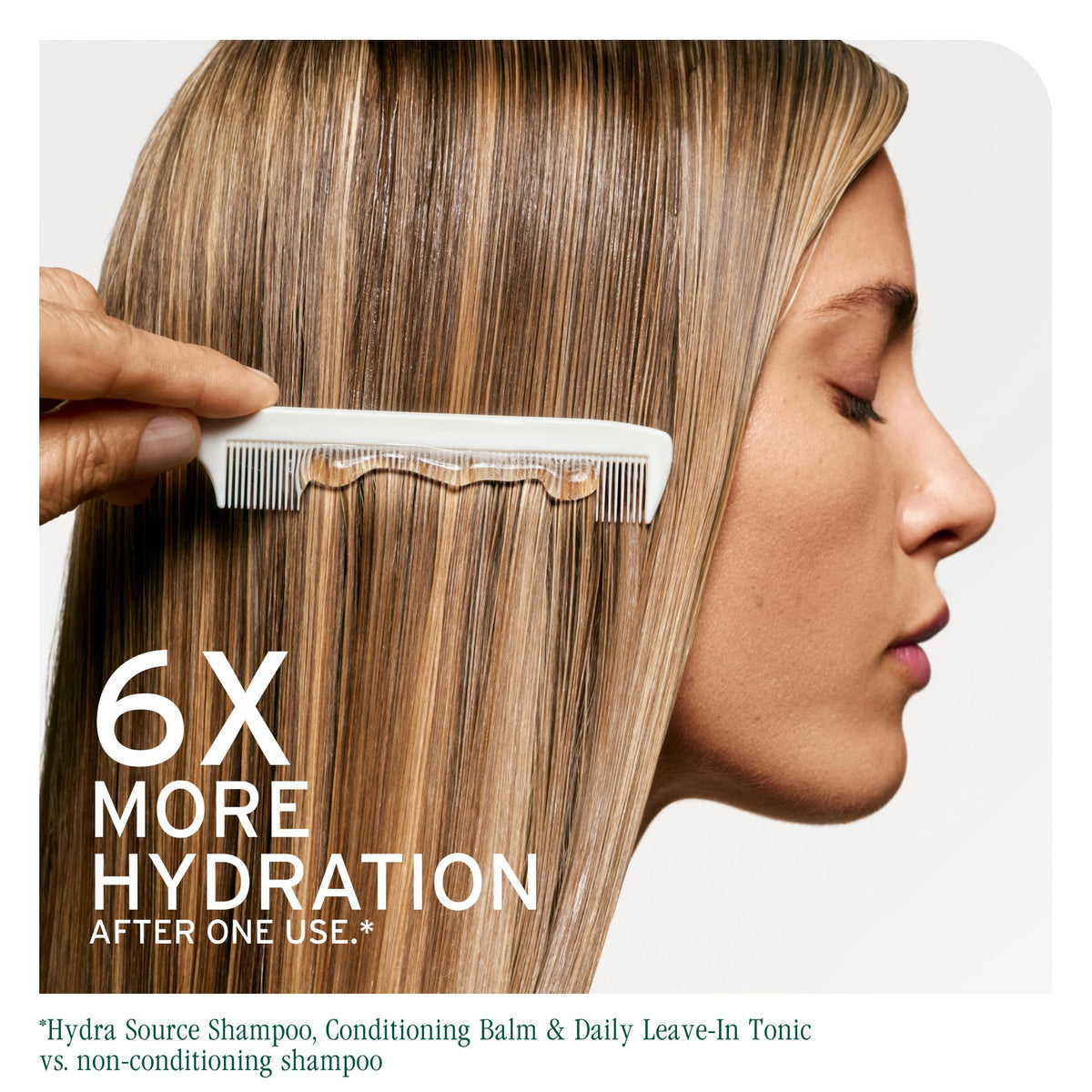 Biolage Hydra Source Detangling Solution application on wet hair