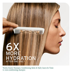 Biolage Hydra Source Detangling Solution application on wet hair