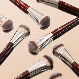 BK BEAUTY 109 Mini Contoured Foundation Brush with other makeup tools
