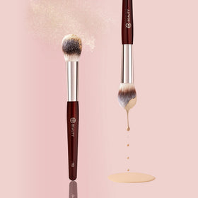 BK BEAUTY 110 Large Concealer Brush in hand demonstrating use