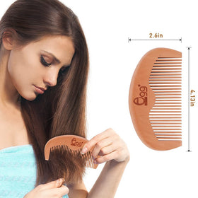 BLACK EGG Detangling Hair Brush showing flexible nylon pins