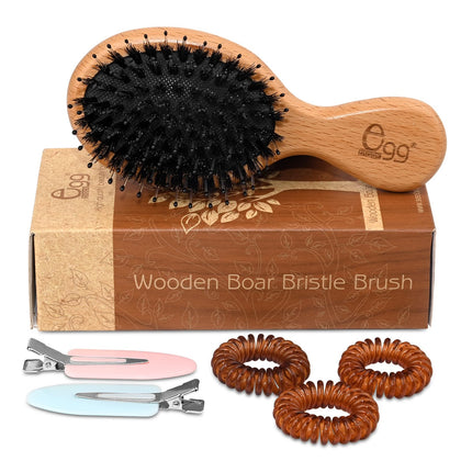 BLACK EGG Mini Hair Brush front view with natural boar bristles