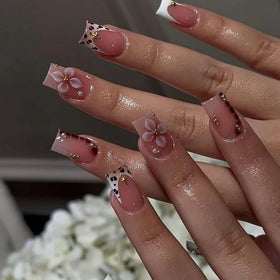 BLGTGH Leopard Print French Tips Press On Nails with floral design displayed