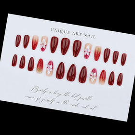 BLGTGH Red Press on Nails displayed with nail file and glue stickers